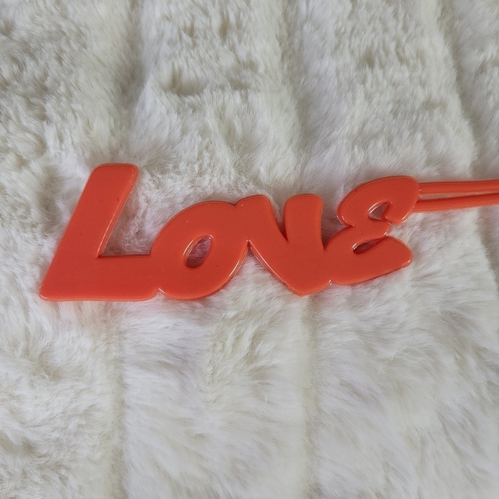 CARMEN SOL // orange-red jelly "love" bag charm
